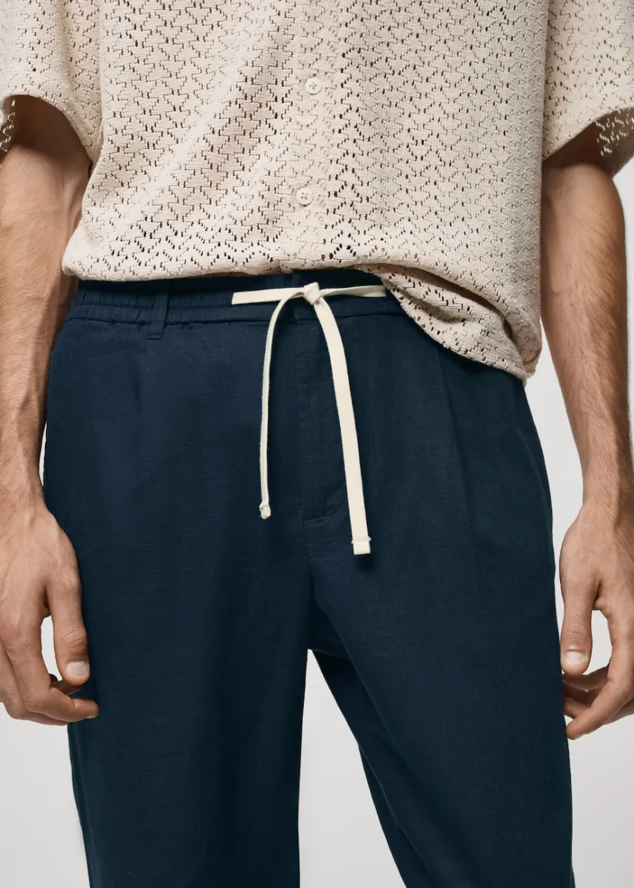 MANGO Spodnie*Spodnie lniane slim fit z troczkami