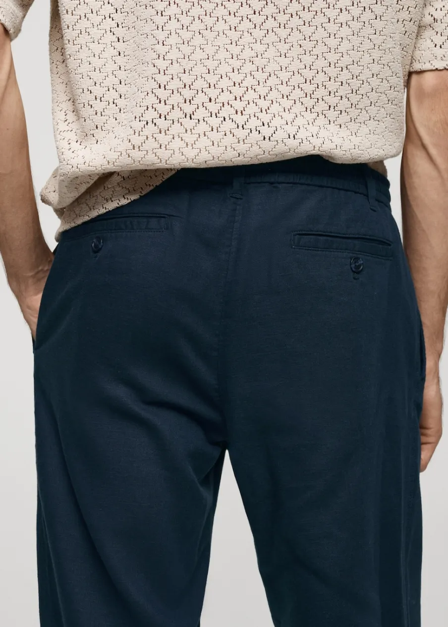 MANGO Spodnie*Spodnie lniane slim fit z troczkami