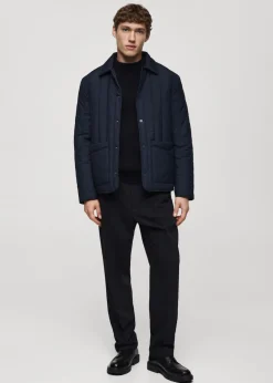 MANGO Spodnie*Spodnie regular fit z lejącej tkaniny z zaszewkami